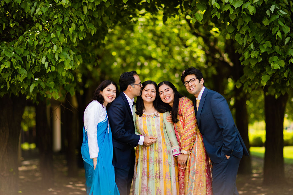 Family portrait in traditional Indian clothing Stock Photo by DragonImages